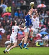 19 June 2016; David Givney of Cavan in action against Mattie Donnelly of Tyrone during the Ulster GAA Football Senior Championship Semi-Final match between Tyrone and Cavan at St Tiernach's Park in Clones, Co Monaghan. Photo by Ramsey Cardy/Sportsfile