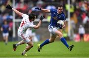 19 June 2016; Gearoid McKiernan of Cavan in action against Ronan McNamee of Tyrone during the Ulster GAA Football Senior Championship Semi-Final match between Tyrone and Cavan at St Tiernach's Park in Clones, Co Monaghan. Photo by Ramsey Cardy/Sportsfile