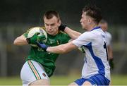 19 June 2016; Keelan McHugh of Leitrim in action against Lorcán Ó Corraoin of Waterford during the GAA Football All-Ireland Senior Championship Qualifier Round 1A match between Leitrim and Waterford at Páirc Seán Mac Diarmada in Carrick-on-Shannon, Co Leitrim. Photo by Seb Daly/Sportsfile