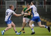 19 June 2016; Paddy Maguire of Leitrim in action against Joey Veale and Thomas O’Gorman of Waterford during the GAA Football All-Ireland Senior Championship Qualifier Round 1A match between Leitrim and Waterford at Páirc Seán Mac Diarmada in Carrick-on-Shannon, Co Leitrim. Photo by Seb Daly/Sportsfile