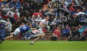 19 June 2016; Colm Cavanagh of Tyrone in action against James McEnroe of Cavan during the Ulster GAA Football Senior Championship Semi-Final match between Tyrone and Cavan at St Tiernach's Park in Clones, Co Monaghan. Photo by Oliver McVeigh/Sportsfile