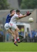19 June 2016; Connor McAliskey of Tyrone in action against Killian Brady of Cavan during the Ulster GAA Football Senior Championship Semi-Final match between Tyrone and Cavan at St Tiernach's Park in Clones, Co Monaghan. Photo by Oliver McVeigh/Sportsfile