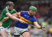 19 June 2016; James Barry of Tipperary in action against Declan Hannon of Limerick during the Munster GAA Hurling Senior Championship Semi-Final match between Limerick and Tipperary at Semple Stadium in Thurles, Co Tipperary. Photo by Ray McManus/Sportsfile