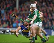 19 June 2016; James Barry of Tipperary in action against Cian Lynch and Paul Browne of Limerick during the Munster GAA Hurling Senior Championship Semi-Final match between Limerick and Tipperary at Semple Stadium in Thurles, Co Tipperary. Photo by Ray McManus/Sportsfile
