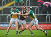 19 June 2016; Joe Canning of Galway ìn action against Sean Ryan, left, and Chris McDonald of Offaly during the Leinster GAA Hurling Senior Championship Semi-Final match between Galway and Offaly at O'Moore Park in Portlaoise, Co Laois. Photo by Cody Glenn/Sportsfile