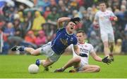 19 June 2016; Tomas Corr of Cavan  in action against Niall Sludden of Tyrone during the Ulster GAA Football Senior Championship Semi-Final match between Tyrone and Cavan at St Tiernach's Park in Clones, Co Monaghan. Photo by Oliver McVeigh/Sportsfile