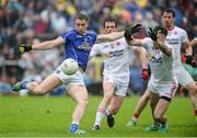19 June 2016; David Givney of Cavan in action against Cathal McCarron of Tyrone during the Ulster GAA Football Senior Championship Semi-Final match between Tyrone and Cavan at St Tiernach's Park in Clones, Co Monaghan. Photo by Oliver McVeigh/Sportsfile