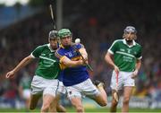 19 June 2016; Noel McGrath of Tipperary in action against Diarmaid Byrnes of Limerick during the Munster GAA Hurling Senior Championship Semi-Final match between Limerick and Tipperary at Semple Stadium in Thurles, Co Tipperary. Photo by Ray McManus/Sportsfile