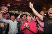 19 June 2016; Rally fans celebrate in the Glen Bar after Manus Kelly and Donall Barrett won the the 2016 Joule Donegal International Rally in a Subaru Impreza WRC S12B, Glen Co.Donegal. Photo by Philip Fitzpatrick/Sportsfile