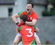 18 June 2016; Darragh Foley and Daniel St Ledger (3) of Carlow celebrate after the final whistle in the GAA Football All-Ireland Senior Championship Qualifier Round 1A match between Carlow and Wicklow at Netwatch Cullen Park in Carlow. Photo by Ray Lohan/Sportsfile
