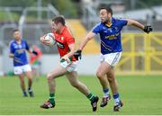 18 June 2016; Hughie Gahan of Carlow in action against Anthony McLoughlin of Wicklow in the GAA Football All-Ireland Senior Championship Qualifier Round 1A match between Carlow and Wicklow at Netwatch Cullen Park in Carlow. Photo by Ray Lohan/Sportsfile