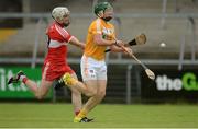 19 June 2016; Niall McKenna of Antrim in action against Oisín McCloskey of Derry during the Ulster GAA Hurling Senior Championship Semi-Final match between Derry and Antrim at the Athletic Grounds in Armagh. Photo by Piaras Ó Mídheach/Sportsfile
