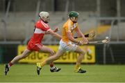 19 June 2016; Niall McKenna of Antrim in action against Oisín McCloskey of Derry during the Ulster GAA Hurling Senior Championship Semi-Final match between Derry and Antrim at the Athletic Grounds in Armagh. Photo by Piaras Ó Mídheach/Sportsfile