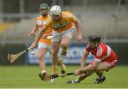 19 June 2016; PJ O'Connell of Antrim in action against Conor Quinn of Derry during the Ulster GAA Hurling Senior Championship Semi-Final match between Derry and Antrim at the Athletic Grounds in Armagh. Photo by Piaras Ó Mídheach/Sportsfile