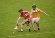 19 June 2016; Eugene McGuckin of Derry in action against Nigel Elliott of Antrim during the Ulster GAA Hurling Senior Championship Semi-Final match between Derry and Antrim at the Athletic Grounds in Armagh. Photo by Piaras Ó Mídheach/Sportsfile