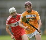 19 June 2016; Eoghan Campbell of Antrim in action against Seán McCullagh of Derry during the Ulster GAA Hurling Senior Championship Semi-Final match between Derry and Antrim at the Athletic Grounds in Armagh. Photo by Piaras Ó Mídheach/Sportsfile