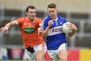 18 June 2016; Stephen Attride of Laois in action against Brendan Donaghy of Armagh during the GAA Football All-Ireland Senior Championship Qualifier Round 1A match between Laois and Armagh at O'Moore Park in Portlaoise, Co. Laois. Photo by Matt Browne/Sportsfile