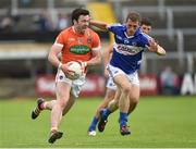 18 June 2016; Aidan Forker of Armagh in action against Gearoid Hanrahan of Laois during the GAA Football All-Ireland Senior Championship Qualifier Round 1A match between Laois and Armagh at O'Moore Park in Portlaoise, Co. Laois. Photo by Matt Browne/Sportsfile