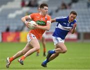 18 June 2016; Joe McElroy of Armagh in action against Niall Donoher of Laois during the GAA Football All-Ireland Senior Championship Qualifier Round 1A match between Laois and Armagh at O'Moore Park in Portlaoise, Co. Laois. Photo by Matt Browne/Sportsfile