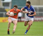 18 June 2016; Charlie Vernon of Armagh in action against Brendan Quigley of Laois during the GAA Football All-Ireland Senior Championship Qualifier Round 1A match between Laois and Armagh at O'Moore Park in Portlaoise, Co. Laois. Photo by Matt Browne/Sportsfile