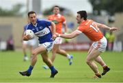 18 June 2016; Niall Donoher of Laois in action against Aidan Forker of Armagh during the GAA Football All-Ireland Senior Championship Qualifier Round 1A match between Laois and Armagh at O'Moore Park in Portlaoise, Co. Laois. Photo by Matt Browne/Sportsfile