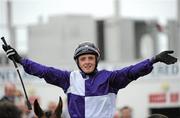 27 July 2010; Winning jockey Chris Hayes celebrates as he enters the parade ring after winning the Topaz Mile European Breeders Fund Handicap on Ask Jack. Galway Racing Festival 2010, Ballybrit, Galway. Picture credit: Ray McManus / SPORTSFILE