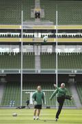 28 July 2010; In advance of this Saturday's O2 Challenge, the first rugby game to be played at the new Aviva Stadium, Irish rugby kicking coach, Mark Tainton, left, was joined by John Baker, winner of an O2 competition to be the first person to attempt a conversion on the new pitch. A Munster/Connacht team will take on a Leinster/Ulster team at the O2 challenge. Aviva Stadium, Lansdowne Road, Dublin. Picture credit: Brian Lawless / SPORTSFILE