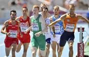 28 July 2010; Ireland's David McCarthy is pushed by Robert Lathouwers of the Netherlands which resulted in the Dutchman being disqualified from their heat of the Men's 800m and McCarthy finishing in 6th in a time of 1:49.53 and qualifying for the semi-finals. 20th European Athletics Championships Montjuïc Olympic Stadium, Barcelona, Spain. Picture credit: Brendan Moran / SPORTSFILE