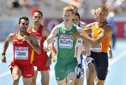 28 July 2010; Ireland's David McCarthy is held by Robert Lathouwers of the Netherlands which resulted in the Dutchman being disqualified from their heat of the Men's 800m and McCarthy finishing in 6th in a time of 1:49.53 and qualifying for the semi-finals. 20th European Athletics Championships Montjuïc Olympic Stadium, Barcelona, Spain. Picture credit: Brendan Moran / SPORTSFILE