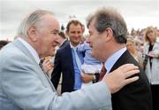 28 July 2010; Winning owner J.P. McManus is congratulated by former Taoiseach Albert Reynolds after Finger Onthe Pulse won the www.thetote.com Galway Plate, Steeplechase Handicap, Grade A. Galway Racing Festival 2010, Ballybrit, Galway. Picture credit: Ray McManus / SPORTSFILE