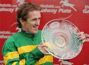 28 July 2010; Winning jockey Tony McCoy with the Galway Plate after winning the www.thetote.com Galway Plate, Steeplechase Handicap, Grade A, on  Finger Onthe Pulse. Galway Racing Festival 2010, Ballybrit, Galway. Picture credit: Ray McManus / SPORTSFILE