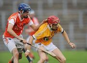 28 July 2010; Christopher Quinn, Antrim, in action against Paul Gaffney, Armagh. Bord Gáis Energy GAA Hurling Under 21 Ulster Championship Final, Antrim v Armagh, Casement Park, Belfast, Co. Antrim. Picture credit: Oliver McVeigh / SPORTSFILE