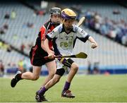 21 June 2016; Eoin Keys of Scoil San Treasa, Mount Merrion, Dublin, in action against Connell McGlynn of St. Colmcilles Senior National School, Knocklyon, Dublin during the Corn Herald match between St Colmcilles Senior National School and Scoil San Treasa during the Allianz Cumann na mBunscol Finals at Croke Park in Dublin. Photo by Sam Barnes/SPORTSFILE