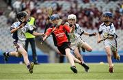 21 June 2016; Cian Kelly of St Colmcilles Senior National School, Knocklyon, in action against, from left, Oisín Kiran, Tim O'Donnell and Andrew Dillon of Scoil San Treasa, Mount Merrion, during the Corn Herald match between St Colmcilles Senior National School and Scoil San Treasa during the Allianz Cumann na mBunscol Finals at Croke Park in Dublin. Photo by Sam Barnes/Sportsfile