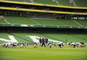 30 July 2010; The Leinster/Ulster squad warm up before their open training session ahead of their combined provinces match against Munster/Connacht to mark the opening of the new Aviva Stadium on Saturday. Aviva Stadium, Lansdowne Road, Dublin. Picture credit: Barry Cregg / SPORTSFILE