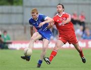 18 July 2010; Kieran Hughes, Monaghan, in action against Martin Penrose, Tyrone. Ulster GAA Football Senior Championship Final, Monaghan v Tyrone, St Tighearnach's Park, Clones, Co. Monaghan. Picture credit: Oliver McVeigh / SPORTSFILE