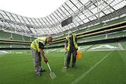 30 July 2010; Groundstaff prepare the pitch after ahead of the combined provinces match to mark the opening of the new Aviva Stadium on Saturday. Aviva Stadium, Lansdowne Road, Dublin. Picture credit: Barry Cregg / SPORTSFILE