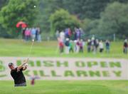 30 July 2010; Darren Clarke plays from a bunker onto the 18th green. 3 Irish Open Golf Championship, Killeen Course, Killarney Golf & Fishing Club, Killarney, Co. Kerry. Picture credit: Matt Browne / SPORTSFILE