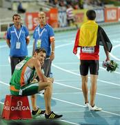 30 July 2010; A dejected David Gillick, of Ireland, sits on the track as winner Kevin Borlee, of Belgium, walks away with the bouquet. Gillick finished 5th in a time of 45.28 sec. 20th European Athletics Championships Montjuïc Olympic Stadium, Barcelona, Spain. Picture credit: Brendan Moran / SPORTSFILE