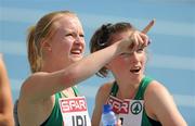 31 July 2010; Ireland's Amy Foster and Niamh Whelan watch the scoreboard for their time after their heat in the Women's 4 x 100m where they finished 4th in a time of 43.93 sec but failed to qualify for the final. 20th European Athletics Championships Montjuïc Olympic Stadium, Barcelona, Spain. Picture credit: Brendan Moran / SPORTSFILE