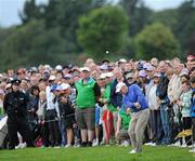 31 July 2010; Paul McGinley plays his second shot onto the first green. 3 Irish Open Golf Championship, Killeen Course, Killarney Golf & Fishing Club, Killarney, Co. Kerry. Picture credit: Matt Browne / SPORTSFILE