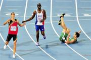 30 July 2010; Ireland's David Gillick falls on the track after crossing the finish line in 5th place behind winner Kevin Borlee, left, of Belgium, and Leslie Djhone, of France, in the Men's 400m Final in a time of 45.28 sec. 20th European Athletics Championships Montjuïc Olympic Stadium, Barcelona, Spain. Picture credit: Brendan Moran / SPORTSFILE