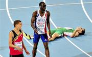 30 July 2010; Ireland's David Gillick falls on the track after crossing the finish line in 5th place behind winner Kevin Borlee, left, of Belgium, and Leslie Djhone, of France, in the Men's 400m Final in a time of 45.28 sec. 20th European Athletics Championships Montjuïc Olympic Stadium, Barcelona, Spain. Picture credit: Brendan Moran / SPORTSFILE