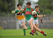31 July 2010; Michael Forde, Mayo, in action against Paul McPadden, Offaly. ESB GAA Football All-Ireland Minor Championship Quarter-Final, Mayo v Offaly, Dr. Hyde Park, Roscommon. Picture credit: Barry Cregg / SPORTSFILE