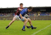 31 July 2010; James Noonan, Longford, in action against Jack Vaughan, Galway. ESB GAA Football All-Ireland Minor Championship Quarter-Final, Longford v Galway, Dr. Hyde Park, Roscommon. Picture credit: Barry Cregg / SPORTSFILE
