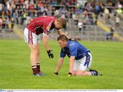 31 July 2010; Tom Curran, Galway, commiserates with Conor Clarke, Longford at the end of the game. ESB GAA Football All-Ireland Minor Championship Quarter-Final, Longford v Galway, Dr. Hyde Park, Roscommon. Picture credit: Barry Cregg / SPORTSFILE