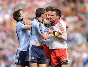 31 July 2010; Bryan Cullen and Alan Brogan, Dublin, get involved in an altercation with Conor Gormley and Ryan McMenamin, Tyrone, during the game. GAA Football All-Ireland Senior Championship Quarter-Final, Tyrone v Dublin, Croke Park, Dublin. Picture credit: Oliver McVeigh / SPORTSFILE