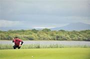 31 July 2010; Ross Fisher lines up a putt on the 10th green during his 3rd round. 3 Irish Open Golf Championship, Killeen Course, Killarney Golf & Fishing Club, Killarney, Co. Kerry. Picture credit: Diarmuid Greene / SPORTSFILE