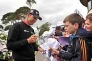 31 July 2010; Padraig Harrington signs an autograph for Stephen Ahern, from Ballyseedy, Co. Kerry, after finishing his 3rd round. 3 Irish Open Golf Championship, Killeen Course, Killarney Golf & Fishing Club, Killarney, Co. Kerry. Picture credit: Diarmuid Greene / SPORTSFILE