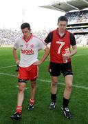 31 July 2010; A dejected Philip Jordan and John Devine, Tyrone, leave the pitch after the game. GAA Football All-Ireland Senior Championship Quarter-Final, Tyrone v Dublin, Croke Park, Dublin. Picture credit: Oliver McVeigh / SPORTSFILE